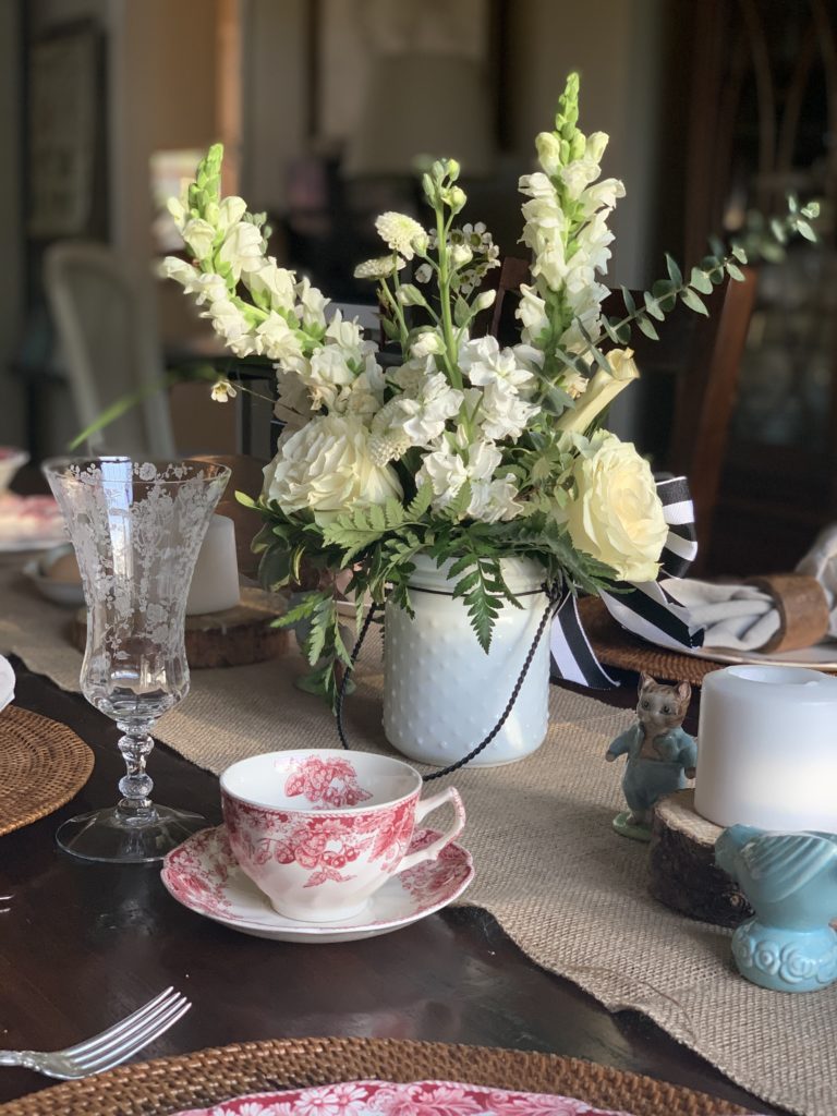 home atmosphere and education flowers table setting